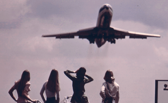 Girls Watching Plane (EJ+Pollution).png