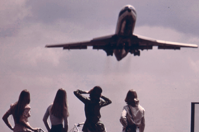 Girls Watching Plane (EJ+Pollution).png