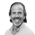 A black-and-white headshot of Christopher Borick