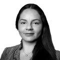 A black-and-white headshot of America Quinteros Condoretty