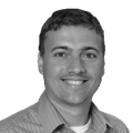 A black-and-white headshot of Celso Ferreira
