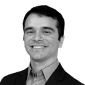 A black-and-white headshot of Victor Freret