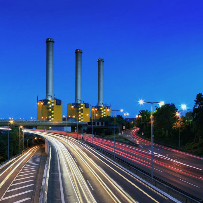 Power station near the highway in Berlin at rush hour (Berlin, Germany)