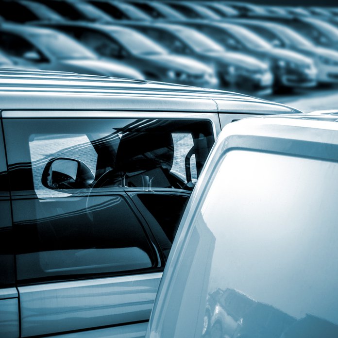 New cars in the dealership in a row