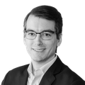 Headshot of Jeffrey Shrader in black and white