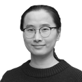 A headshot of Xuan Teng in black and white