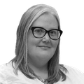 A black-and-white headshot of Amy Townsend-Small