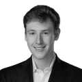 A black-and-white headshot of Daniel Weiss