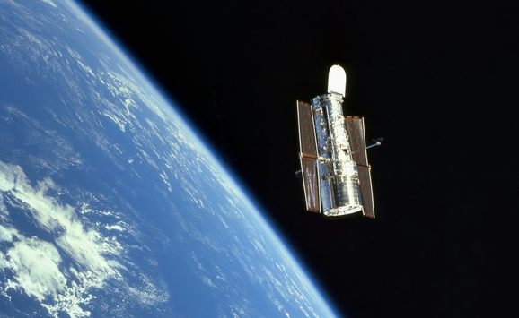 The NASA Hubble space telescope orbiting Earth