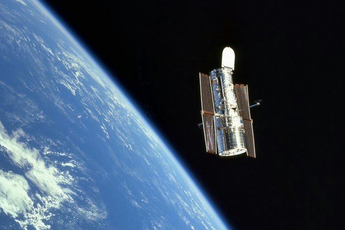 The NASA Hubble space telescope orbiting Earth