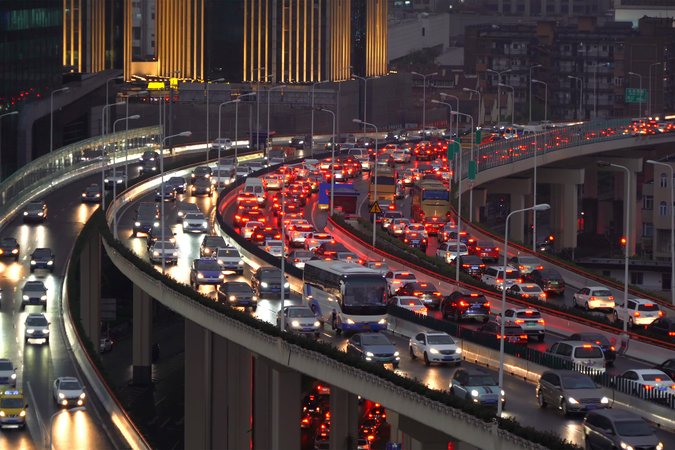 Cars stuck in traffic on a many-lane highway