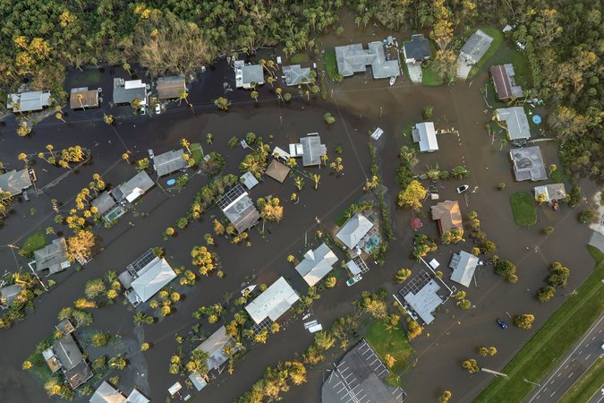Aerial image of flooded roads and houses in Florida following Hurricane Ian.