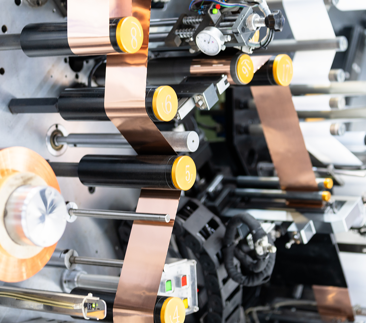 A close-up of machinery in a lithium battery production line