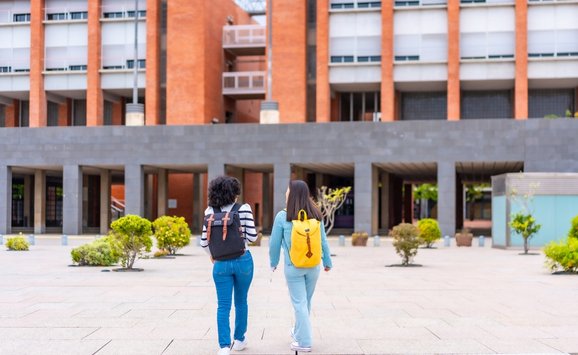 students walking on college campus