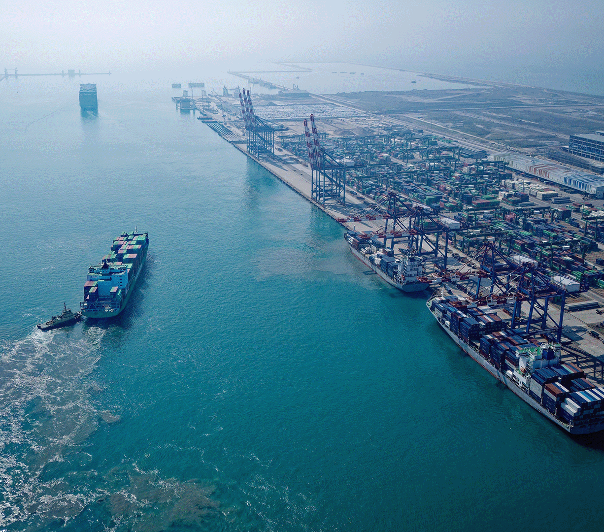 Cargo ships pull up to a port in New Taipei City, Taiwan