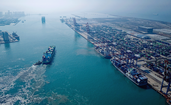 Cargo ships pull up to a port in New Taipei City, Taiwan
