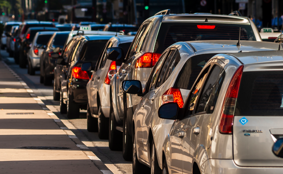 Cars backed up bumper-to-bumper on a road