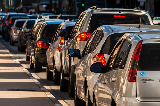 Cars backed up bumper-to-bumper on a road