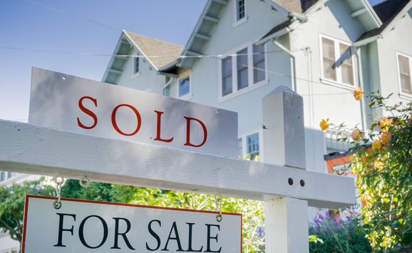 For sale sign sold house